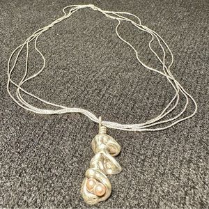 Vintage silver artisan necklace on liquid silver chain. Handmade in Big Sur, CA